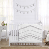 Sweet Jojo Designs boho 4-piece crib bedding with fringe for a cozy nursery.