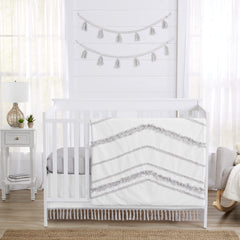 Sweet Jojo Designs boho 4-piece crib bedding with fringe for a cozy nursery.