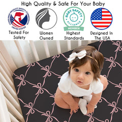 Black and blush bows print adds ballet-inspired charm to the nursery.