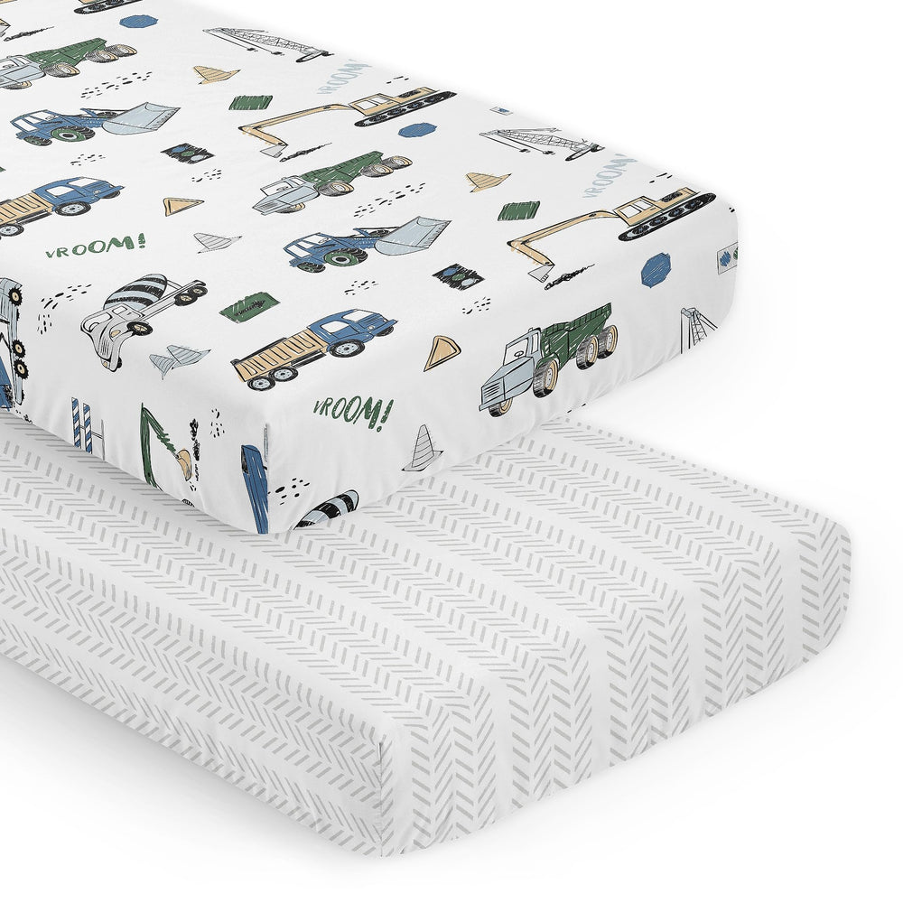 Sweet Jojo Designs construction truck print crib sheet offers soft microfiber comfort for naps.