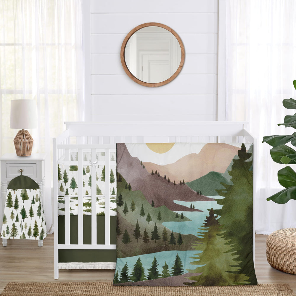 Sweet Jojo Designs crib comforter with forest tree print for a cozy nursery look