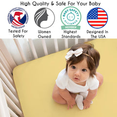 Sweet Jojo Designs crib skirt in white complements sunburst print