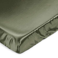 Sweet Jojo Designs dark green satin crib sheet closeup shows soft texture and durability.