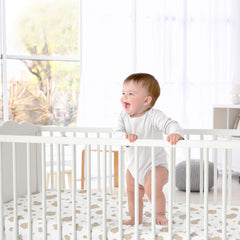 Sweet Jojo Designs farm-animal print crib sheet; durable fabric for busy families.