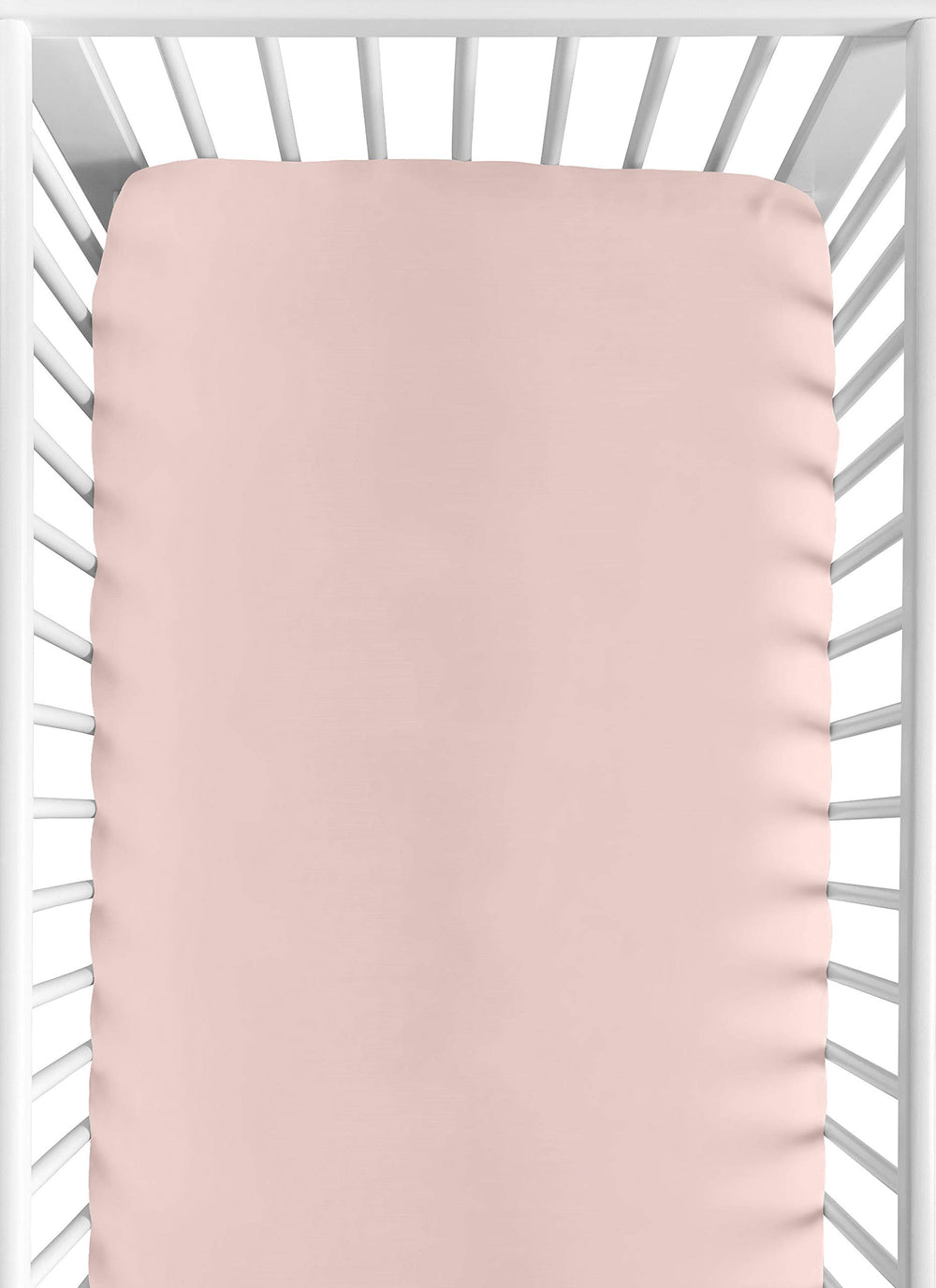 Sweet Jojo Designs fitted crib sheet in solid pink for a cozy newborn sleep.