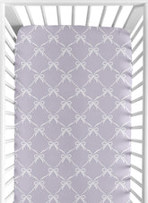 Sweet Jojo Designs fitted crib sheet in white and purple bows for a cozy nursery