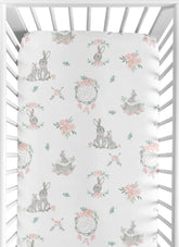 Sweet Jojo Designs crib sheet in woodland boho floral for a snug, gentle sleep surface.