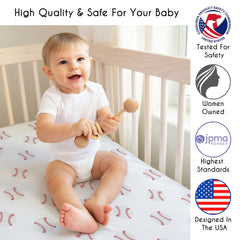 Sweet Jojo Designs mini crib sheet elastic edge closeup showing secure fit