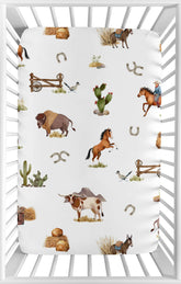 Sweet Jojo Designs mini crib sheet with western cowboy print offers snug fit.