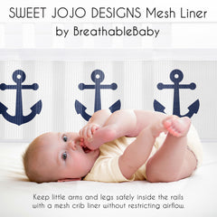 Sweet Jojo Designs nautical anchors print mesh, coordinates with navy bedding for a cohesive nursery.