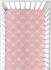 Sweet Jojo Designs pink bows crib sheet closeup, soft brushed microfiber for gentle baby sleep.