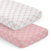 Sweet Jojo Designs pink and white bows crib sheets close-up showing soft microfiber for gentle sleep.