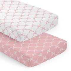 Sweet Jojo Designs pink and white bows crib sheets close-up showing soft microfiber for gentle sleep.