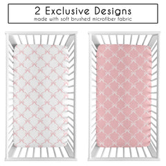 Sweet Jojo Designs pink and white bows pattern on sheets for a coordinated nursery look.