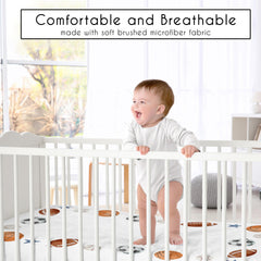 Sweet Jojo Designs vintage sports crib sheet on crib illustrating secure fit
