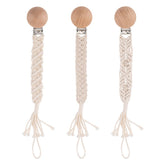 Symbolife boho pacifier clip with wooden teeth secures pacifier and protects clothing.