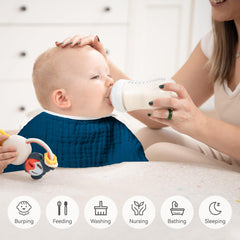Synrroe burp cloths being used for baby cleaning and diapering tasks