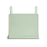 The Table Tyke teething-edge bumper placemat protects tables during meals.
