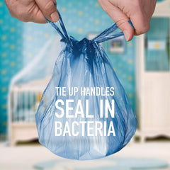 Disposal of dirty diapers with Tadge Goods leak-proof bags in nursery.