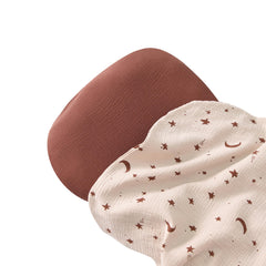 Tado Muslin cover oatmeal stripes blends with any nursery theme.