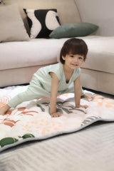 TADO MUSLIN whale-design play mat offers a soft, safe crawl area.
