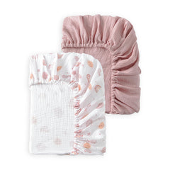 TADO MUSLIN rainbow crib sheet close-up shows soft, breathable fabric for gentle sleep.