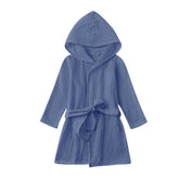 TADO MUSLIN toddler bathrobe front view in navy, cozy hooded layer for warm bath time.
