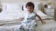 Tado Muslin Toddler Sleep Sack worn by child illustrating sleeveless design for airflow.