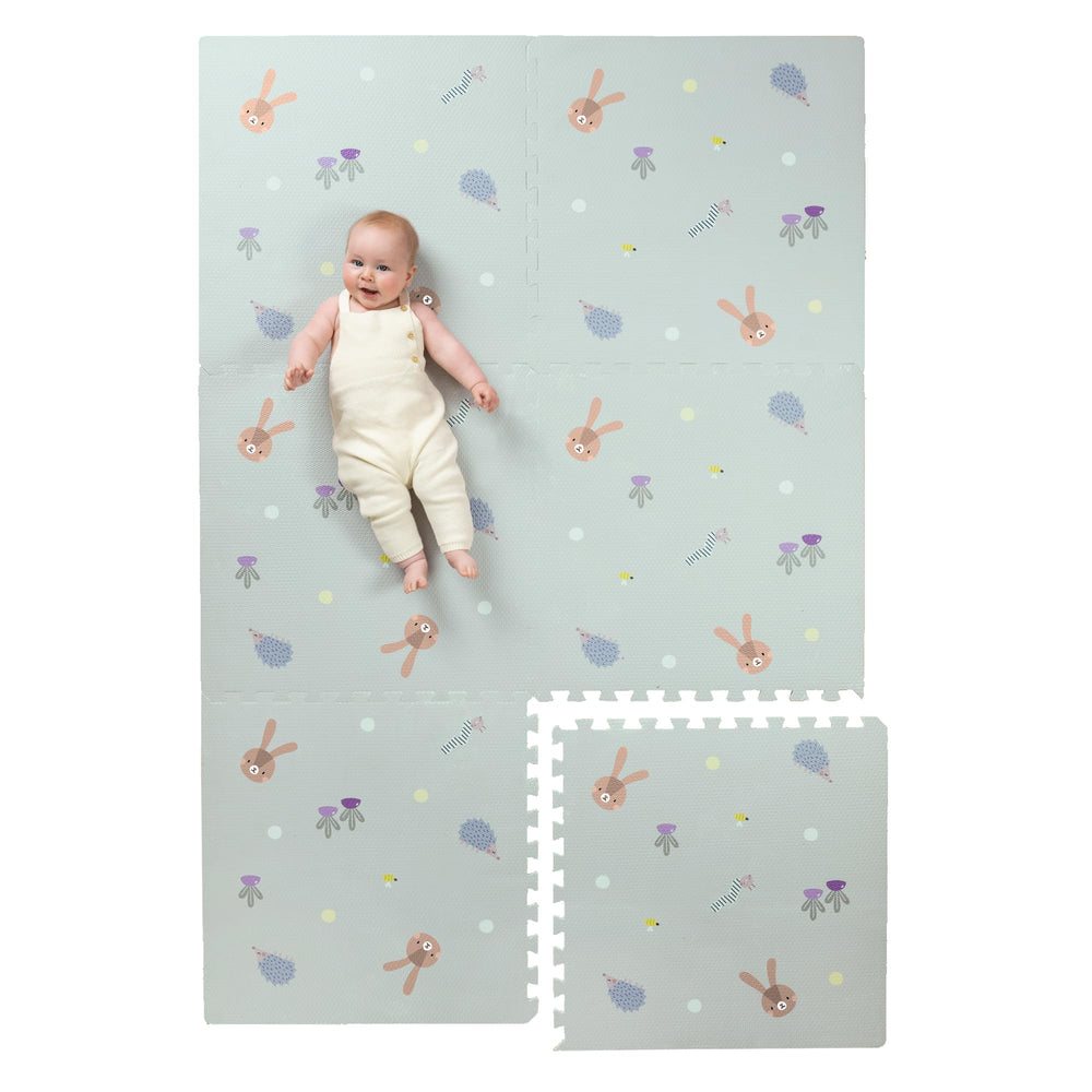 Taf Toys Baby Play Mat folded in carry case for easy storage and travel.