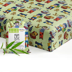 Tafts viscose crib sheet on bed with Pirate design, offering cooling comfort and soft touch.