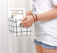 Tamicy baby-toy-bin helps families create a playful, clutter-free play area.