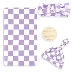 Tanofar purple checkerboard swaddle blanket for newborn comfort and breathable fabric.