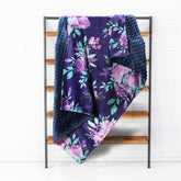TANOFAR Purple watercolor floral blanket for nursery warmth and comfort.