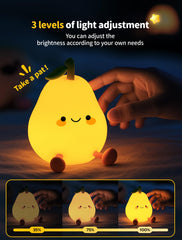 Tarinks pear night light with smiley face creates friendly nursery atmosphere.