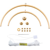 Tatuo nursery wind bell semi-circular design for soothing visual focus.