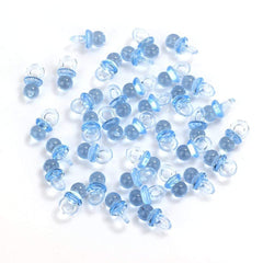 Tayarana blue tiny acrylic pacifiers enhance table decor and DIY charm at baby showers.