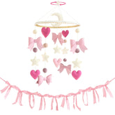 Teeloray pink bow mobile for crib enhances nursery visuals with gentle motion.
