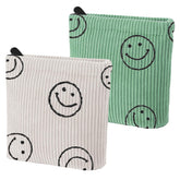 Teircno corduroy period bag with a smiley design for discreet napkin storage.