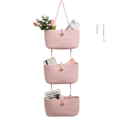 TeoKJ over-the-door pink three-tier basket keeps toys organized.