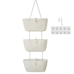 TeoKJ over-the-door cotton baskets with wooden button detail keep nursery items organized.