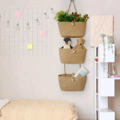TeoKJ wall-mounted nursery organizer keeping toys and essentials tidy.