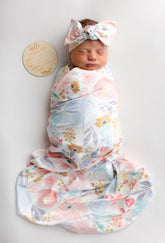 Terriboo newborn floral wrap blanket for cozy swaddling and photography.