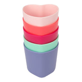 The First Years heart-shaped toddler cups promote proper hand placement during sipping.