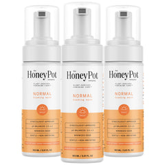 The Honey Pot balance bottle pump shows gentle cleansing with pH balance.