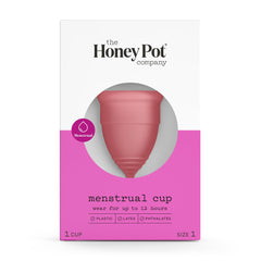 The Honey Pot menstrual cup Size 1 held in hand, soft silicone for reusable protection.