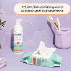 Foaming wash lather from The Honey Pot Prebiotic Wash demonstrates gentle cleansing with prebiotics.