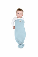 The Ollie Swaddle mimic-womb design aids soothing transitions for restful periods.
