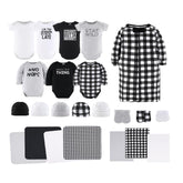 The Peanutshell baby layette gift set layout shows 23 pieces for newborn girls.