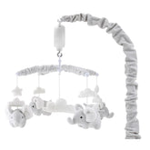 The Peanutshell crib mobile with elephants, clouds, and stars for calming visuals.