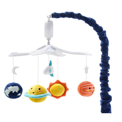 The Peanutshell crib mobile with planets and rocket brighten nursery decor.